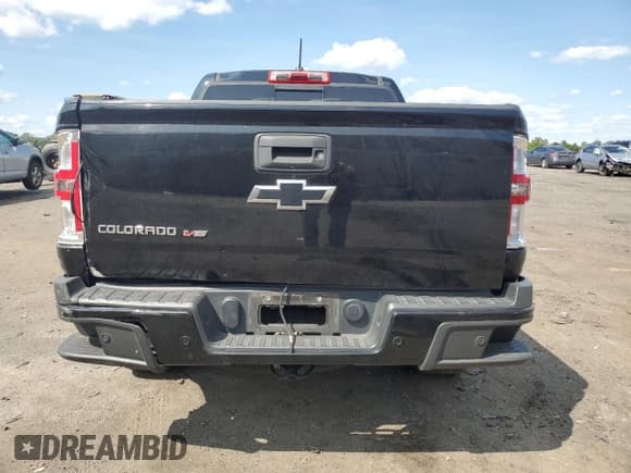 ✅ 2019 Chevrolet Colorado 4WD Z71 • VIN: 1GCGTDEN1K1283409 • Лот: 67734904. Опубликован ранее на Copart с пробегом 87 835 миль. Бесплатный доступ к архиву аукционных продаж из США и подробный отчёт об истории автомобиля на DreamBid. Изображение 6.