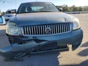 ✅ 2005 Mercury Montego Luxury • VIN: 1MEFM40135G600734 • Лот: 75420854. Опубликован ранее на Copart с пробегом 111 969 миль. Бесплатный доступ к архиву аукционных продаж из США и подробный отчёт об истории автомобиля на DreamBid. Изображение 5.