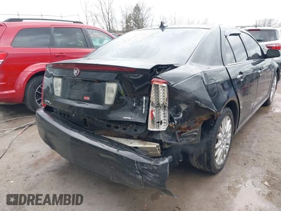 ✅ 2010 Cadillac STS AWD • VIN: 1G6DU6EV1A0101565 • Lot: 41846364. Listed on IAAI with 145,980 mi. Free auction sales archive from the USA and detailed vehicle history report at DreamBid. Image 6.