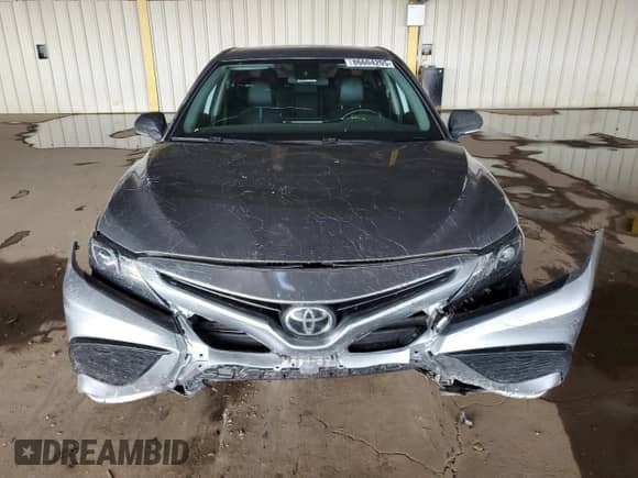 2022 Toyota Camry SE z VIN 4T1G11AK0NU621820, wystawiony jako Copart lot #86604205 z przebiegiem 101 107 mil mil oraz Szkoda całkowita • Salvage title. Historia ofert i sprzedaży dostępna na DreamBid. Obrazek 5.