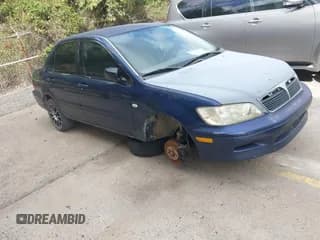 ✅ 2002 Mitsubishi Lancer ES • VIN: JA3AJ26E32U066634 • Lot: 43560354. Wystawiony na IAAI z przebiegiem 162 750 mil. Bezpłatny archiwum sprzedaży aukcyjnych z USA i szczegółowy raport historii pojazdu na DreamBid. Zdjęcie 1.