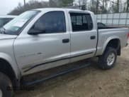 ✅ 2002 Dodge Dakota SLT • VIN: 1B7HG48N82S581583 • Lot: 41525790. Wystawiony na IAAI z przebiegiem 255 806 mil. Bezpłatny archiwum sprzedaży aukcyjnych z USA i szczegółowy raport historii pojazdu na DreamBid. Zdjęcie 18.