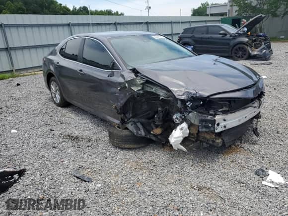 2023 Toyota Camry LE с VIN 4T1C11BK1PU102890, выставлен на аукционе Copart как лот 62864095 с пробегом 67 528 миль миль и Списание • Salvage title. История ставок и продаж доступна на DreamBid. Изображение 4.