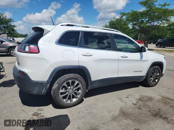 ✅ 2019 Jeep Cherokee Altitude • VIN: 1C4PJLLB9KD184232 • Lot: 63369575. Listed on Copart with 142,041 mi. Free auction sales archive from the USA and detailed vehicle history report at DreamBid. Image 3.