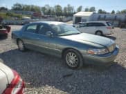 ✅ 2006 Lincoln Town Car Signature • VIN: 1LNHM81W16Y602727 • Lot: 82496205. Listed on Copart with 97,537 mi. Free auction sales archive from the USA and detailed vehicle history report at DreamBid. Image 4.