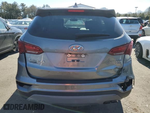 ✅ 2018 Hyundai Santa Fe Limited • VIN: 5XYZUDLA8JG548878 • Лот: 46062075. Опубликован ранее на Copart с пробегом 99 061 миль. Бесплатный доступ к архиву аукционных продаж из США и подробный отчёт об истории автомобиля на DreamBid. Изображение 6.