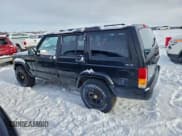 ✅ 1998 Jeep Cherokee Sport • VIN: 1J4FJ68S9WL150447 • Lot: 95184265. Listed on Copart with 231,976 mi. Free auction sales archive from the USA and detailed vehicle history report at DreamBid. Image 2.