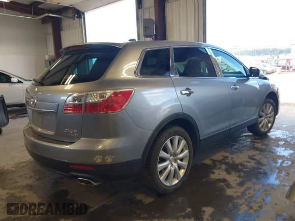 ✅ 2010 Mazda CX-9 Touring • VIN: JM3TB3MV2A0202488 • Lot: 42142544. Listed on IAAI with 94,126 mi. Free auction sales archive from the USA and detailed vehicle history report at DreamBid. Image 4.