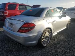 ✅ 2005 Mercedes-Benz SLK AMG • VIN: WDBWK73FX5F054969 • Лот: 74960714. Опубликован ранее на Copart с пробегом Не указан. Бесплатный доступ к архиву аукционных продаж из США и подробный отчёт об истории автомобиля на DreamBid. Изображение 3.
