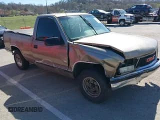 ✅ 1996 GMC Sierra 1500 • VIN: 1GTEC14W5TZ505114 • Лот: 41804874. Опубликован ранее на IAAI с пробегом 261 989 миль. Бесплатный доступ к архиву аукционных продаж из США и подробный отчёт об истории автомобиля на DreamBid. Изображение 1.