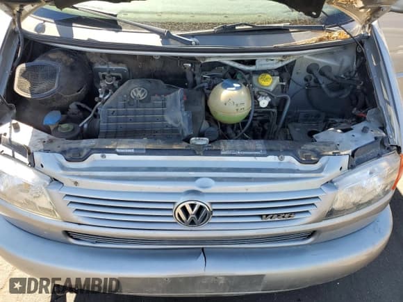 ✅ 2000 Volkswagen EuroVan • VIN: WV2MH4701YH133906 • Лот: 72370794. Опубликован ранее на Copart с пробегом Не указан. Бесплатный доступ к архиву аукционных продаж из США и подробный отчёт об истории автомобиля на DreamBid. Изображение 12.