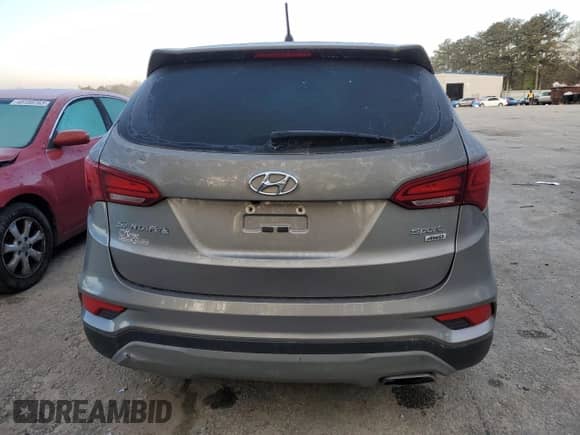 ✅ 2018 Hyundai Santa Fe 2.4L • VIN: 5XYZTDLB0JG562768 • Lot: 45202753. Wystawiony na Copart z przebiegiem Nie podano mil. Skorzystaj z bezpłatnego archiwum sprzedaży aukcyjnych z USA i zobacz szczegółowy raport historii pojazdu na DreamBid. Zdjęcie 6.