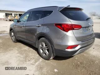 ✅ 2017 Hyundai Santa Fe 2.4L • VIN: 5NMZU3LB5HH002638 • Лот: 42825133. Опубликован ранее на Copart с пробегом 99 604 миль. Бесплатный доступ к архиву аукционных продаж из США и подробный отчёт об истории автомобиля на DreamBid. Изображение 2.