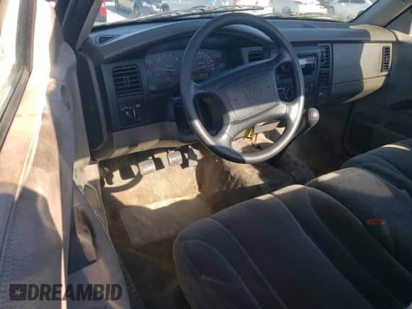 2002 Dodge Dakota Sport z VIN 1B7FL36X42S669287, wystawiony jako Copart lot #77607224 z przebiegiem 112 334 mil mil oraz Czysty tytuł • Clean title. Historia ofert i sprzedaży dostępna na DreamBid. Obrazek 8.