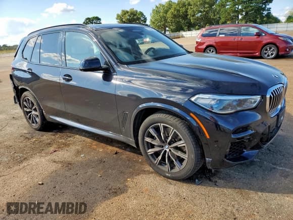✅ 2022 BMW X5 xDrive40i • VIN: 5UXCR6C03N9J21530 • Lot: 89696575. Listed on Copart with 87,822 mi. Free auction sales archive from the USA and detailed vehicle history report at DreamBid. Image 4.