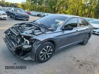 ✅ 2024 Volkswagen Jetta S • VIN: 3VW5M7BU0RM000512 • Lot: 82249785. Listed on Copart with 26,599 mi. Free auction sales archive from the USA and detailed vehicle history report at DreamBid. Image 1.