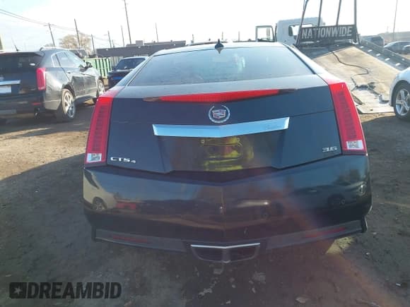 ✅ 2014 Cadillac CTS Performance • VIN: 1G6DG1E35E0169673 • Lot: 43698420. Listed on IAAI with 84,034 mi. Free auction sales archive from the USA and detailed vehicle history report at DreamBid. Image 16.