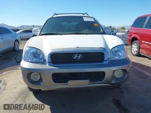 ✅ 2004 Hyundai Santa Fe GLS • VIN: KM8SC13E44U672070 • Lot: 43383997. Listed on IAAI with 219,150 mi. Free auction sales archive from the USA and detailed vehicle history report at DreamBid. Image 12.