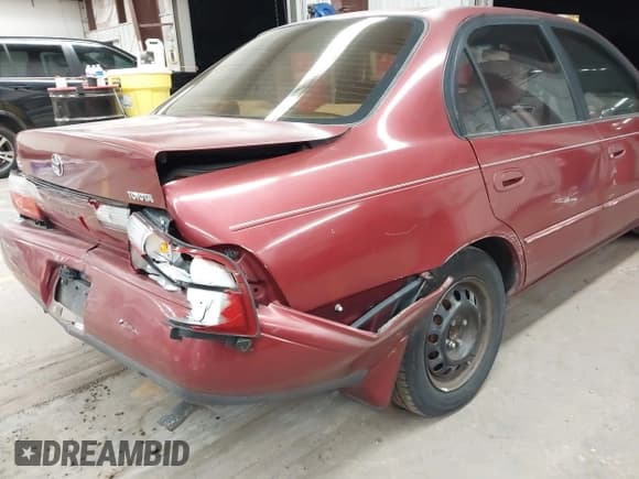 ✅ 1997 Toyota Corolla DX • VIN: 1NXBB02E2VZ601840 • Lot: 43774906. Listed on IAAI with 169,903 mi. Free auction sales archive from the USA and detailed vehicle history report at DreamBid. Image 13.