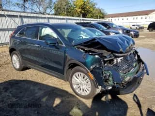 ✅ 2024 Cadillac XT4 FWD Luxury • VIN: 1GYAZAR49RF232462 • Lot: 86451335. Wystawiony na Copart z przebiegiem 9 017 mil. Bezpłatny archiwum sprzedaży aukcyjnych z USA i szczegółowy raport historii pojazdu na DreamBid. Zdjęcie 4.