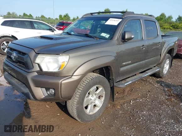✅ 2012 Toyota Tacoma PreRunner • VIN: 3TMJU4GNXCM128023 • Lot: 43136343. Listed on IAAI with 134,815 mi. Free auction sales archive from the USA and detailed vehicle history report at DreamBid. Image 18.