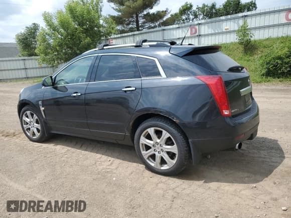 ✅ 2011 Cadillac SRX Turbo Premium Collection • VIN: 3GYFNKE62BS583827 • Лот: 59840715. Опубликован ранее на Copart с пробегом 87 754 миль. Бесплатный доступ к архиву аукционных продаж из США и подробный отчёт об истории автомобиля на DreamBid. Изображение 2.