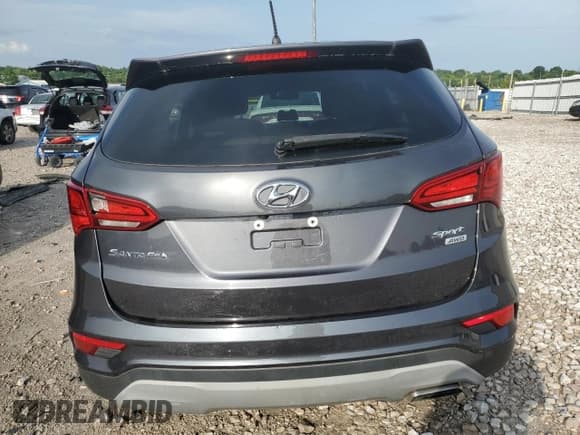 ✅ 2018 Hyundai Santa Fe 2.4L • VIN: 5XYZTDLB8JG569810 • Лот: 67123594. Опубликован ранее на Copart с пробегом 110 374 миль. Бесплатный доступ к архиву аукционных продаж из США и подробный отчёт об истории автомобиля на DreamBid. Изображение 6.