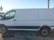 ✅ 2021 Ford Transit Cargo • VIN: 1FTYE1Y89MKA16809 • Lot: 41643195. Listed on IAAI with 7,407 mi. Free auction sales archive from the USA and detailed vehicle history report at DreamBid. Image 14.