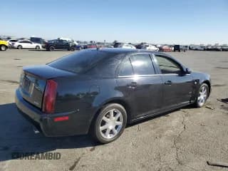 ✅ 2005 Cadillac STS • VIN: 1G6DC67A250124128 • Лот: 72842524. Опубликован ранее на Copart с пробегом 98 535 миль. Бесплатный доступ к архиву аукционных продаж из США и подробный отчёт об истории автомобиля на DreamBid. Изображение 3.