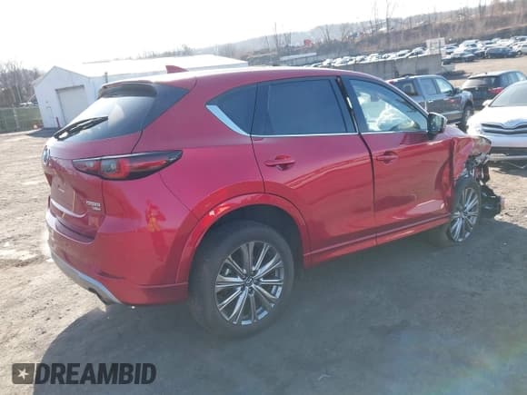 ✅ 2024 Mazda CX-5 Signature • VIN: JM3KFBXY1R0353821 • Lot: 41773620. Listed on IAAI with 21,889 mi. Free auction sales archive from the USA and detailed vehicle history report at DreamBid. Image 4.