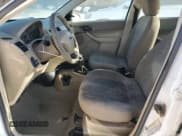 ✅ 2005 Ford Focus S • VIN: 1FAFP34N05W169006 • Lot: 92454825. Listed on Copart with Not provided. Free auction sales archive from the USA and detailed vehicle history report at DreamBid. Image 7.