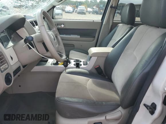 ✅ 2009 Mercury Mariner Premier • VIN: 4M2CU87G99KJ21818 • Лот: 60359645. Опубликован ранее на Copart с пробегом 173 639 миль. Бесплатный доступ к архиву аукционных продаж из США и подробный отчёт об истории автомобиля на DreamBid. Изображение 7.