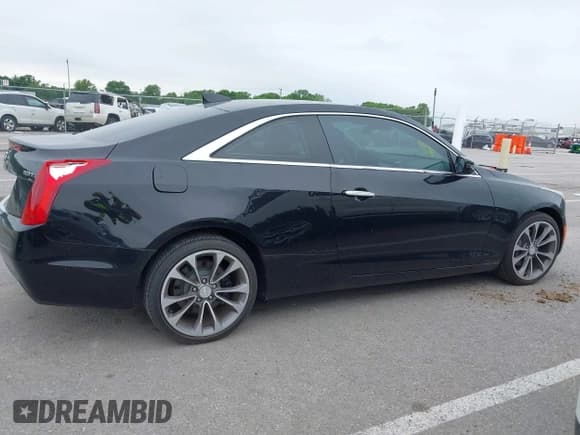 ✅ 2016 Cadillac ATS • VIN: 1G6AJ1RX7G0163622 • Лот: 42338078. Опубликован ранее на IAAI с пробегом 64 700 миль. Бесплатный доступ к архиву аукционных продаж из США и подробный отчёт об истории автомобиля на DreamBid. Изображение 13.