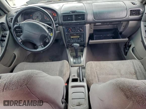 ✅ 2001 Subaru Forester L • VIN: JF1SF63521H718479 • Лот: 94539755. Опубликован ранее на Copart с пробегом 305 407 миль. Бесплатный доступ к архиву аукционных продаж из США и подробный отчёт об истории автомобиля на DreamBid. Изображение 8.