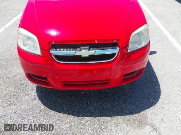 ✅ 2010 Chevrolet Aveo 1LT • VIN: KL1TD5DE0AB126585 • Lot: 42219460. Wystawiony na IAAI z przebiegiem 148 785 mil. Bezpłatny archiwum sprzedaży aukcyjnych z USA i szczegółowy raport historii pojazdu na DreamBid. Zdjęcie 12.