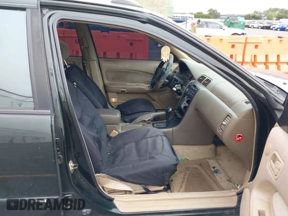 ✅ 1997 Nissan Maxima GXE • VIN: JN1CA21D3VT801392 • Лот: 43329320. Опубликован ранее на IAAI с пробегом 158 905 миль. Бесплатный доступ к архиву аукционных продаж из США и подробный отчёт об истории автомобиля на DreamBid. Изображение 5.