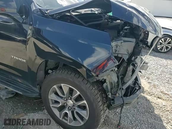 2022 Chevrolet Tahoe LT z VIN 1GNSCNKDXNR255391, wystawiony jako Copart lot #85759385 z przebiegiem Nie podano mil oraz Nie do naprawy • Non repairable. Historia ofert i sprzedaży dostępna na DreamBid. Obrazek 14.