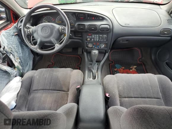 ✅ 2001 Pontiac Grand Prix GT • VIN: 1G2WP52K31F101943 • Lot: 67346575. Wystawiony na Copart z przebiegiem 147 994 mil. Bezpłatny archiwum sprzedaży aukcyjnych z USA i szczegółowy raport historii pojazdu na DreamBid. Zdjęcie 8.