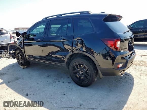 ✅ 2024 Honda Passport Black Edition • VIN: 5FNYF8H86RB002604 • Lot: 58368835. Listed on Copart with 14,145 mi. Free auction sales archive from the USA and detailed vehicle history report at DreamBid. Image 2.