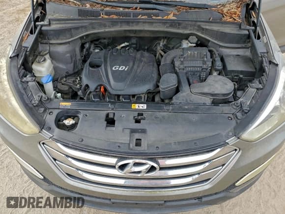 ✅ 2014 Hyundai Santa Fe • VIN: 5XYZU3LB7EG163658 • Lot: 94418485. Listed on Copart with 188,728 mi. Free auction sales archive from the USA and detailed vehicle history report at DreamBid. Image 12.