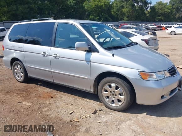 ✅ 2004 Honda Odyssey EX-L • VIN: 5FNRL18074B011223 • Lot: 43203727. Wystawiony na IAAI z przebiegiem 219 053 mil. Bezpłatny archiwum sprzedaży aukcyjnych z USA i szczegółowy raport historii pojazdu na DreamBid. Zdjęcie 1.
