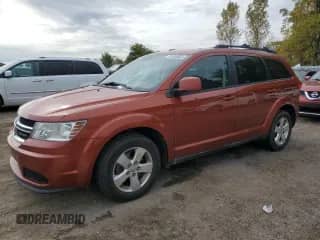 2013 Dodge Journey American Value с VIN 3C4PDCABXDT504116, выставлен на аукционе Copart как лот 82558635 с пробегом 283 086 миль миль и Чистый • Clean title. История ставок и продаж доступна на DreamBid. Изображение 1.