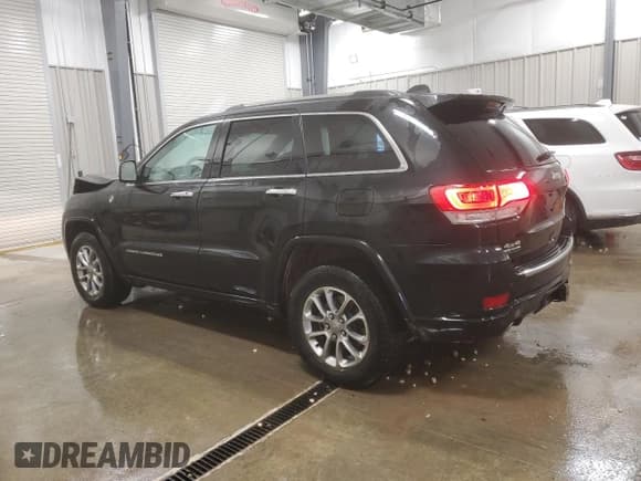 ✅ 2015 Jeep Grand Cherokee Overland • VIN: 1C4RJFCM8FC815544 • Lot: 80519904. Listed on Copart with 132,490 mi. Free auction sales archive from the USA and detailed vehicle history report at DreamBid. Image 2.