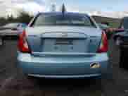 2006 Hyundai Accent GLS with VIN KMHCN46C56U004971, listed as a Copart auction lot 77301034 with 229,170 mi miles and Salvage title. Bid and sale history available at DreamBid. Image 6.