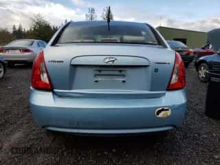 2006 Hyundai Accent GLS with VIN KMHCN46C56U004971, listed as a Copart auction lot 77301034 with 229,170 mi miles and Salvage title. Bid and sale history available at DreamBid. Image 6.