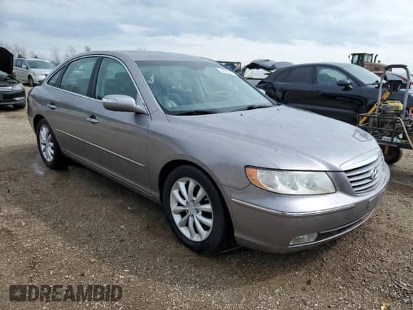 2007 Hyundai Azera SE с VIN KMHFC46F77A235046, выставлен на аукционе Copart как лот 54210305 с пробегом 190 250 миль миль и Списание • Salvage title. История ставок и продаж доступна на DreamBid. Изображение 4.