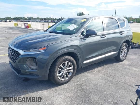 ✅ 2019 Hyundai Santa Fe SE • VIN: 5NMS23AD1KH044131 • Lot: 43237640. Wystawiony na IAAI z przebiegiem 105 619 mil. Bezpłatny archiwum sprzedaży aukcyjnych z USA i szczegółowy raport historii pojazdu na DreamBid. Zdjęcie 2.