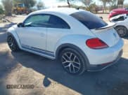 ✅ 2016 Volkswagen Beetle Dune • VIN: 3VWS17AT8GM632868 • Lot: 43810321. Listed on IAAI with 75,311 mi. Free auction sales archive from the USA and detailed vehicle history report at DreamBid. Image 3.