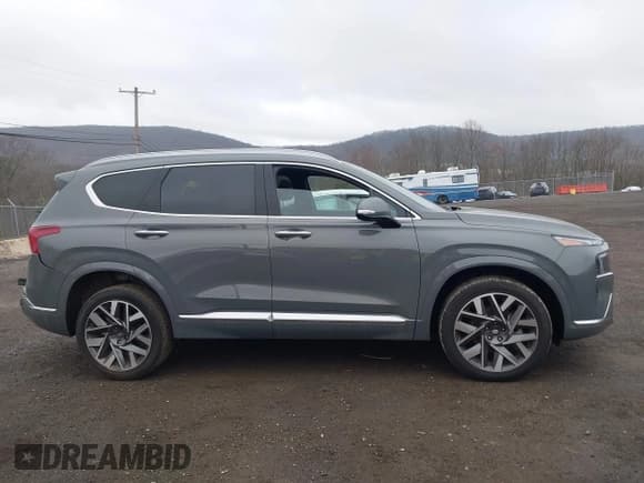 ✅ 2023 Hyundai Santa Fe Calligraphy • VIN: 5NMS5DAL5PH649846 • Lot: 41918854. Listed on IAAI with 14,605 mi. Free auction sales archive from the USA and detailed vehicle history report at DreamBid. Image 13.