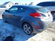 ✅ 2014 Hyundai Veloster • VIN: KMHTC6AD6EU204015 • Lot: 41318917. Wystawiony na IAAI z przebiegiem 77 355 mil. Bezpłatny archiwum sprzedaży aukcyjnych z USA i szczegółowy raport historii pojazdu na DreamBid. Zdjęcie 3.